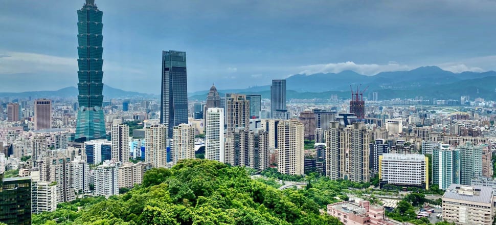 In Taipei, buildings block cooling breezes from flowing between mountain and sea